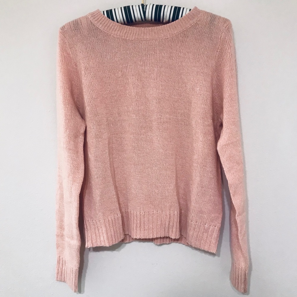 Pink knitted sweater